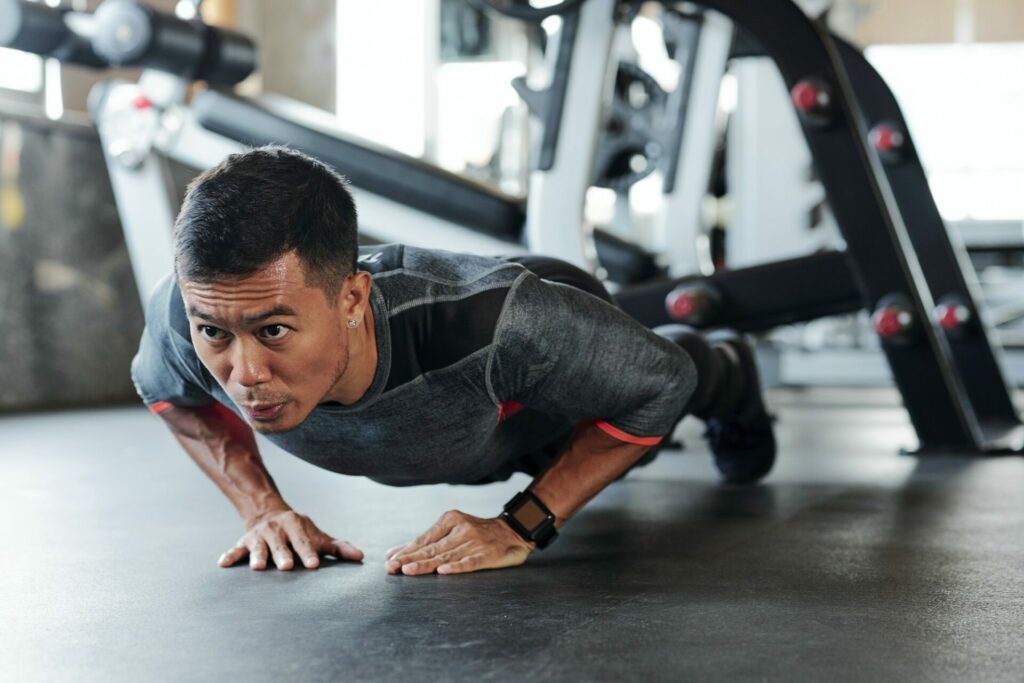 Man doing diamond push-ups